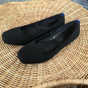 Rothy's Black Ballet Flats with Blue Heel Tab